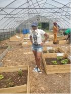 Victoria Trotter, founder of Green Movement Glenville, inside one of the farm’s hoop houses